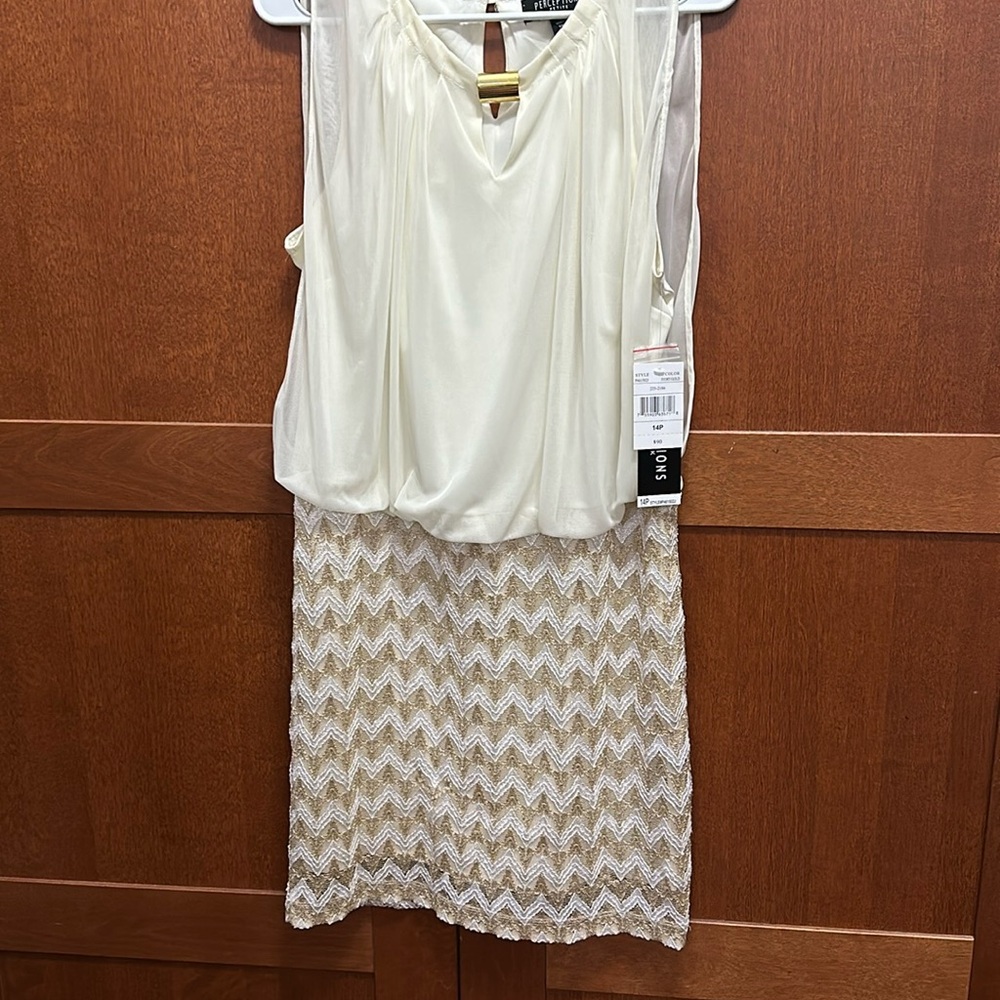 Perceptions sleeveless dress that can be worn to church or to a wedding!